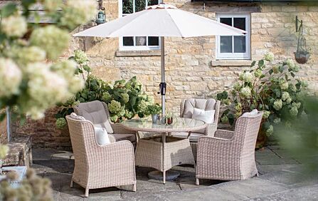 Bramblecrest Chedworth 4 Seat Round Rattan Garden Dining Set with Parasol & Base - Sandstone Bramblecrest Chedworth 4 Seat Round Rattan Garden Dining Set with Parasol & Base - Sandstone