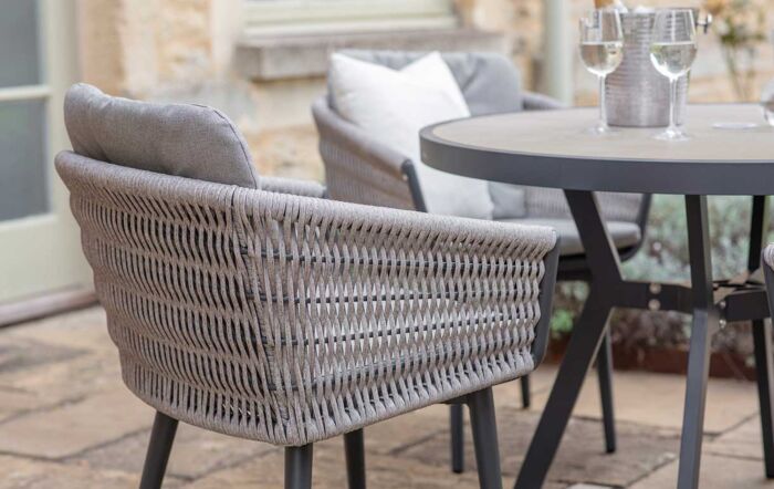 Bramblecrest Mauritius 4 Seat Round Dining Set with Parasol & Base