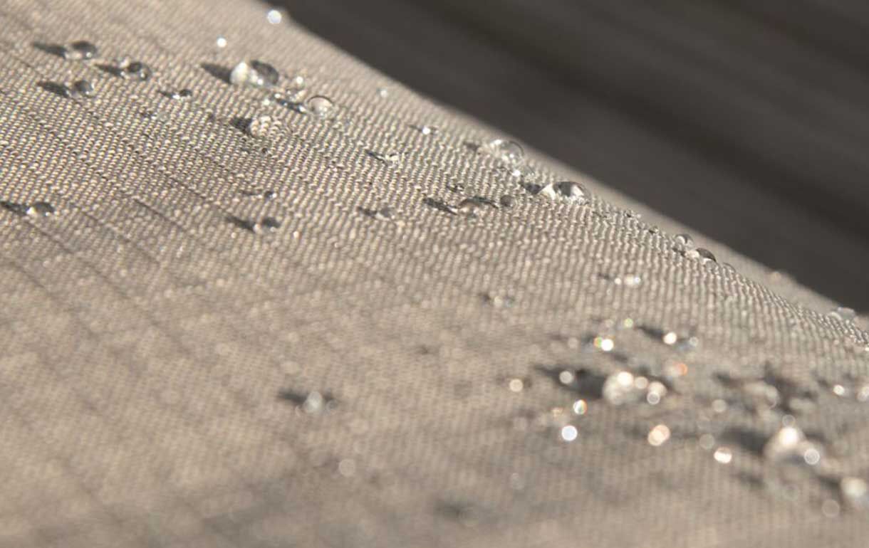 Garden furniture cover with rain droplets