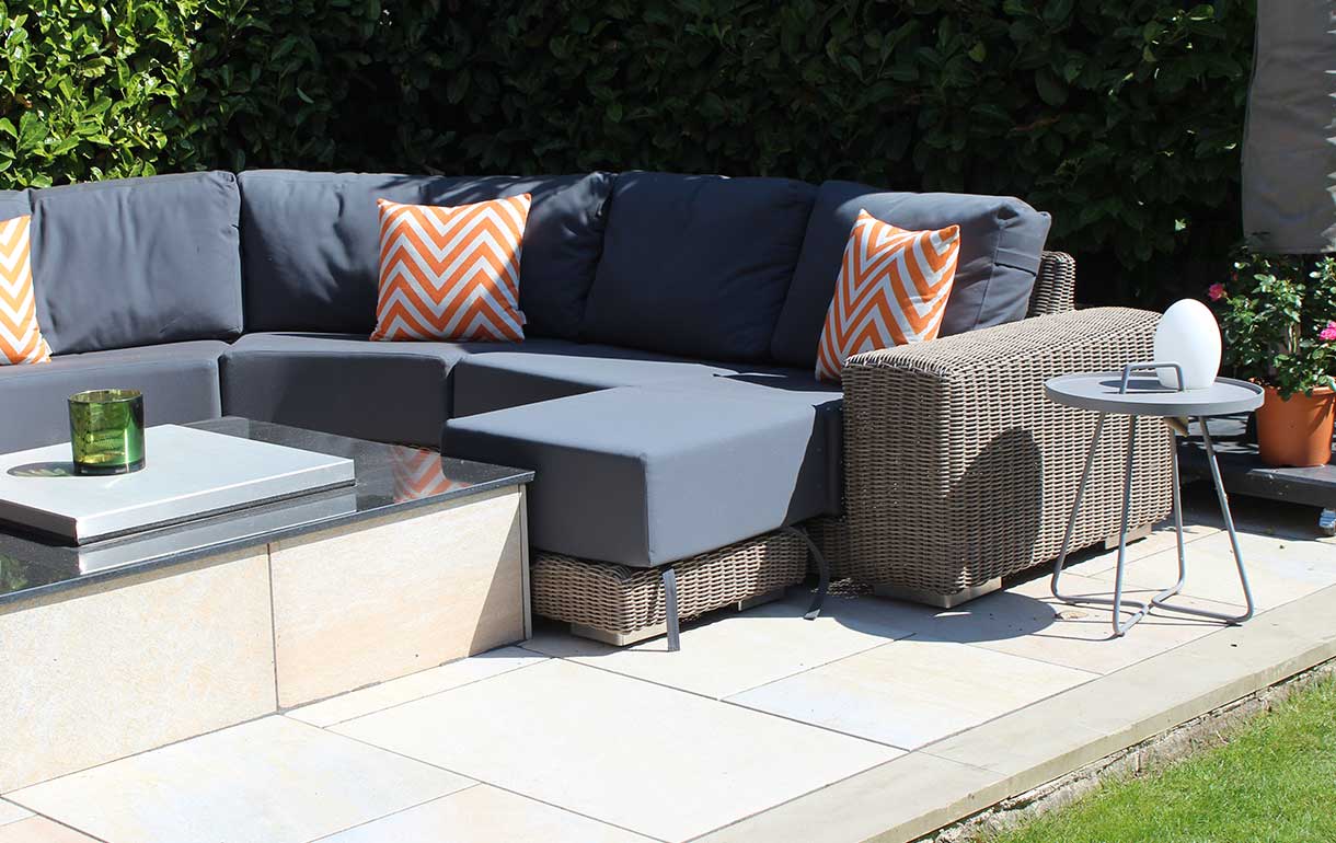 Large rattan garden sofa