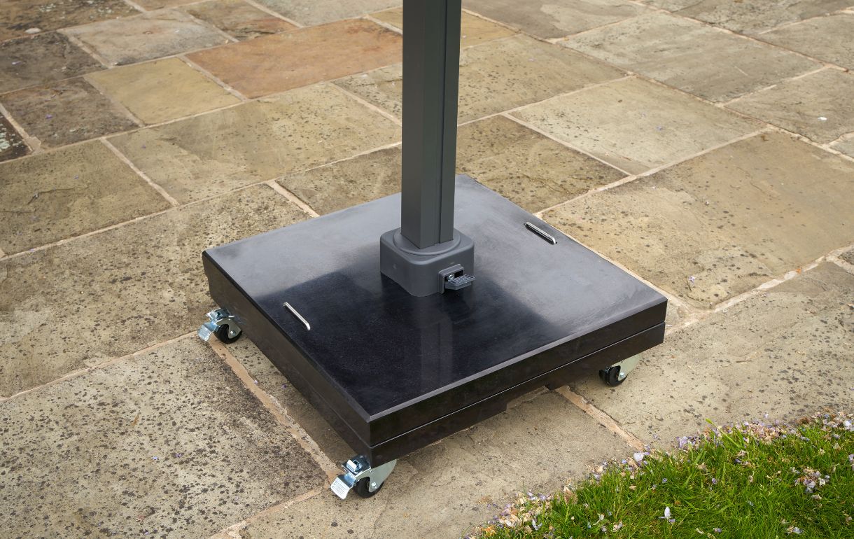 Granite parasol base on wheels