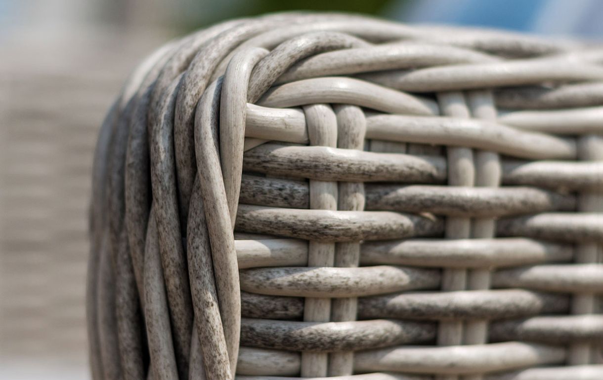 Close up of grey rounded rattan weave