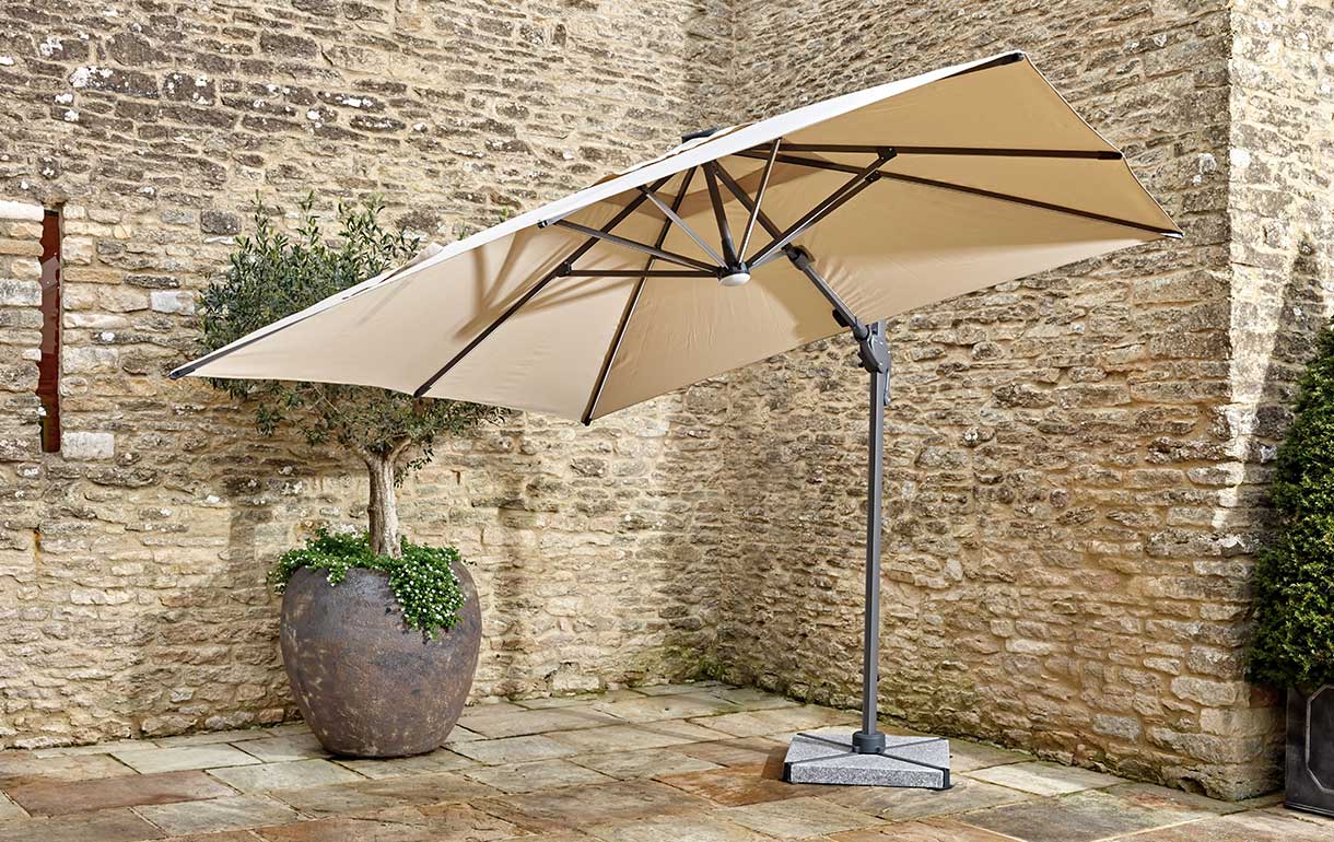 Rotating cantilever parasol