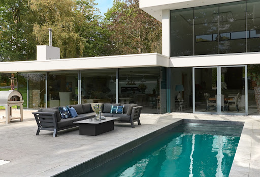 Aluminium corner sofa by the pool